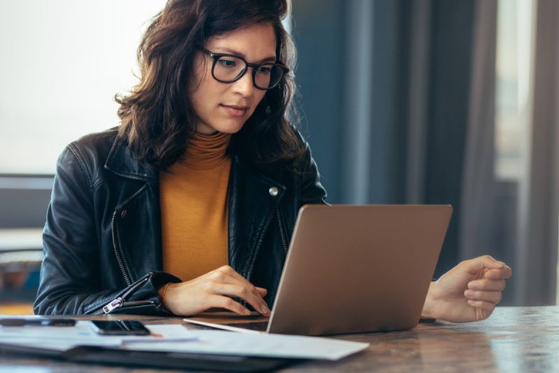 Woman working remotely on her laptop